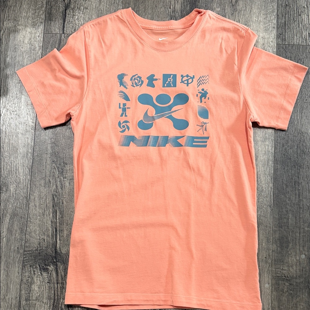 Nike Peach Graphic Tee with Blue Logo